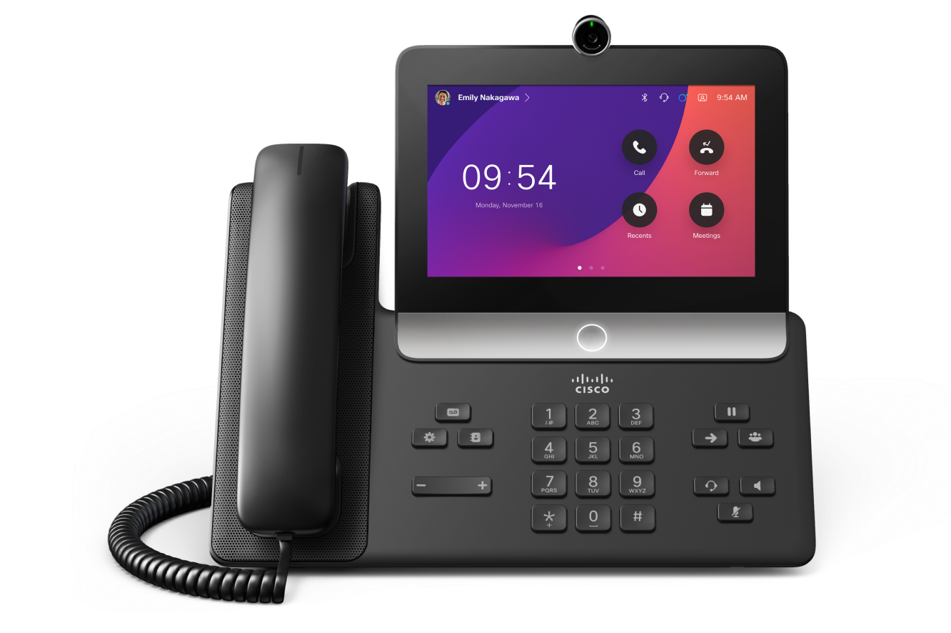 The Cisco Video Phone 8875 in the Carbon color (black).  Screen shows time of 9:54 and apps like Meetings and Call.